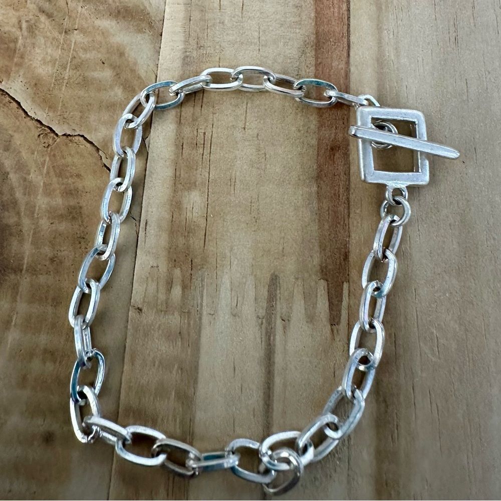 Silver tone toggle closure bracelet